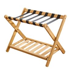 a wooden folding chair with black and white stripes on the bottom, sitting against a white background