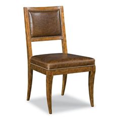 a wooden chair with brown leather upholstered seat