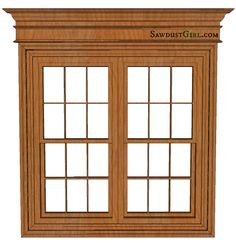 a wooden window with three panes and two windows on each side, in the same color