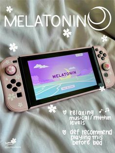 an advertisement for the nintendo wii game, melatonn 2 is displayed on a bed