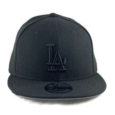 Show everyone where your loyalty lies with this black and black adjustable Los Angeles Dodgers Team snapback. Made of 100% Polyester 9Fifty Snapback Adjustable back strap Black & black colors Classic Black Baseball Cap With Flat Crown, Black Snapback Hat With Flat Crown For Streetwear, Classic Snapback Hat With Flat Bill For Fan Gear, Black Snapback Hat For Sports Events, Black Snapback Hat With Flat Crown For Sports, Classic Flat Bill Snapback Hat For Fan Gear, Black Fitted Hat With Flat Crown For Sports Events, Black Flat Crown Fitted Hat For Sports Events, Urban Black Baseball Cap With Flat Crown