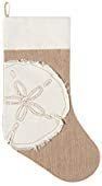 a white christmas stocking hanging from a wooden hanger with an image of a starfish on it