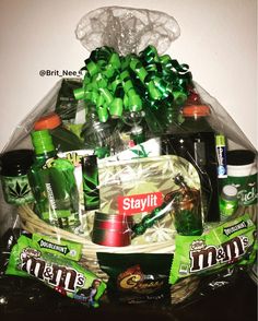 a basket filled with lots of green items