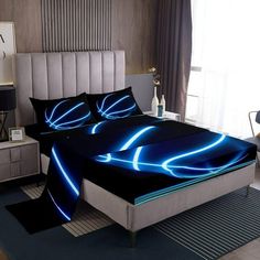 a bed with blue lights on it in a room