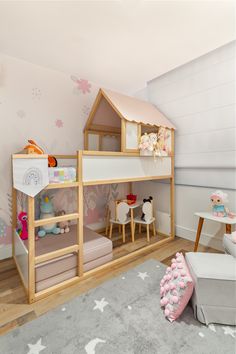 a child's bedroom with bunk beds and toys