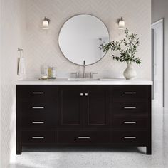 a bathroom with two sinks and a large mirror on the wall above it is shown