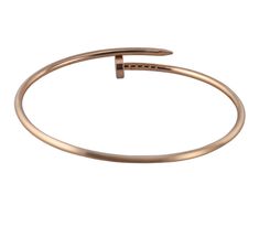 18k rose gold small model Juste Un Clou nail bracelet by Cartier. Retail $3600. Comes with COA. DESIGNER: Cartier MATERIAL: 18k Gold GEMSTONES: None DIMENSIONS: Bracelet is Cartier size 18. MARKED/TESTED: Cartier, Au750, 18, GDW***. WEIGHT: 10.1 grams CONDITION: Previously Owned / Excellent Condition Classic Cartier Rose Gold Bracelets, Classic Cartier Rose Gold Bangle, Cartier Rose Gold Bracelet Gift, Cartier Rose Gold Bracelet For Gift, Cartier Rose Gold Bangle For Wedding, Cartier Rose Gold Bracelets As A Gift, Classic Cartier Rose Gold Bracelet, Cartier Rose Gold Round Bracelet, Designer Cartier Gold Bracelets