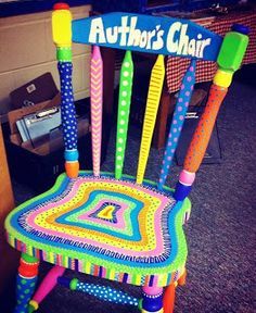 a chair made out of crochet and colored yarn with the name author's chair on it