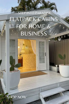 a white house with the words flatpack cabins for home and business