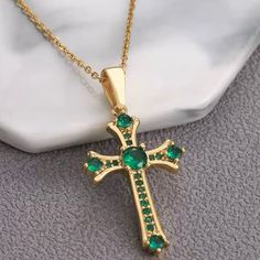 “Emerald Cross Flory” Fleury Coptic Pave Gemstone Encrusted Triple Trefoil Flower Fleur De Lis Lobed Crucifix Catholic Christian Faith Devout Devotion Passion God Jesus Holy Pray Hope High End Elegant Elevated Luxurious Classy 18k Gold Necklace. A Cross Flory (Or Fleury) Is A Cross Adorned At Each Terminal End With Flowers, Fleur-De-Lis, Or Trefoils. The Three Petals Can Symbolize The Holy Trinity; The Virtues Of Wisdom, Faith, And Chivalry; Or 12 Total Petals To Represent The 12 Apostles Who Sp Elegant Green Cross Pendant Necklace, Elegant Green Cross Necklace, Elegant Green Cross Jewelry, Elegant Green Cross-shaped Jewelry, Emerald Cross, The 12 Apostles, 12 Apostles, Catholic Necklace, The Holy Trinity