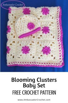 a crocheted blanket with flowers on it and the text, blooming clusters baby set free crochet pattern