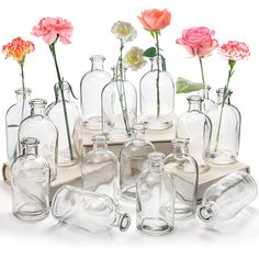 PRICES MAY VARY. YOUEON set of 16 living bud vase measure 5.1"H x 2.4"D, bud bottles have a thin neck and sturdy base to stand well and easily being held. Sufficient quantities are enough to meet your need. Wide range of uses: This glass vase set can be used for long-stemmed flowers or as centerpieces for home decorations, farmhouse home decor, table decor, wedding, party, hotel, restaurant, cafes. It can also be used as an alternative to diffuser bottles and diffuser containers, put in essentia Milk Bottle Flowers, Vases Clear, Bud Vase Centerpiece, Office Table Decor, Glass Vases Centerpieces, Long Stem Flowers, Bottle Centerpieces, Glass Flower Vase, Table Centerpiece Decorations