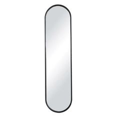 a mirror that is on the wall next to a white background and black trimming