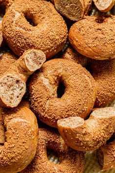 a pile of doughnuts sitting on top of a table