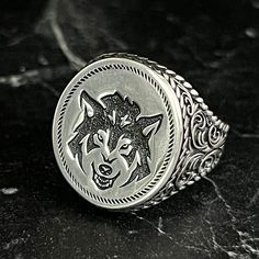 Silver Wild Alpha Wolf Ring For Men , Men Howling Wolf Ring , Handmade Wolf Engraved Ring , Animals Jewelry , Sterling Silver Ring , Gift For Him , Same Day For Shipping ✧ Product Details * Handmade İtem * Gender : Male / Female * Material : 925K Sterling Silver * Ring Weight : 9 Grams ✔ Usage Details * Silver jewelry is very sensitive to chemicals. It is recommended to keep away from chemical substances such as cream, bleach, deodorant, detergent. * Silver jewelry can also darken quickly in salt water, that is, in sea water. For this reason, it is best to remove them when swimming in the sea. ✔ Shipping * Your orders placed on weekdays are delivered to the cargo on the same day. Your orders placed on the weekend are delivered to the cargo on Monday. ✔ Other Details * Our products are hand Silver Ring With Wolf Design, Silver Wolf Design Ring As Gift, Wolf Design Ring Jewelry Gift, Wolf Design Ring Jewelry For Gift, Gift Engraved Stainless Steel Skull Ring, Animals Jewelry, Wolf Ring, Alpha Wolf, Chemical Substances