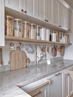 the kitchen counter is clean and ready to be used as a cook's pantry