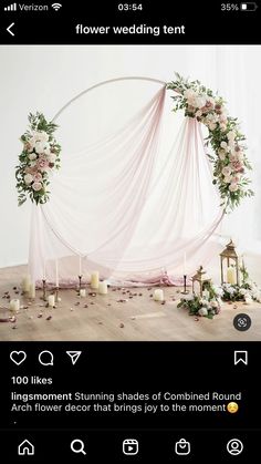 the wedding arch is decorated with flowers and candles