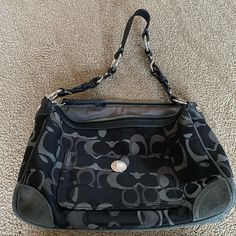 Used But Looks Brand New! Coach Large C Black Handbag. Body And Inside Are Canvas While Bottom Has A Gray Suede And Top And Handle Are Leather. Inside You Will Find 2 Open Pockets And A Zip Up Pouch. Dimensions Are 10 Inches By 9 Inches. Casual Coach Shoulder Bag With Silver-tone Hardware, Gray Everyday Bags With Silver-tone Hardware, Coach Gray Shoulder Bag, Chic Coach Gray Shoulder Bag, Coach Gray Shoulder Bag With Silver-tone Hardware, Chic Gray Coach Shoulder Bag, Gray Shoulder Bag With Silver-tone Hardware For Everyday Use, Coach Gray Rectangular Shoulder Bag, Coach Gray Shoulder Bag For Daily Use