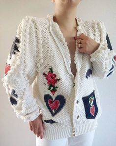 Absolutely amazing and rare true vintage 80's Lechuza cotton cardigan. Front jeans pocket, rich popcorn details and jeans and roses printed patches at the front, back and sleeves.  The Lechuza tag was cut out, but there is still very typical for Lechuza size and fabric tag. Fabric: 95% cotton, 5% leather/ cardigan is really heavy and weight about 1.2kg. Size: 40/42, will fit size M(oversized) up to XL. Measurement, single flat lying: Shoulders 39cm Chest 61cm Length 61cm Sleeve 66cm Spring Vintage Patchwork Cardigan, Vintage Handmade Cardigan For Spring, Handmade Vintage Cardigan For Spring, Retro Cotton Cardigan With Patchwork, Retro Cotton Patchwork Cardigan, Vintage Cotton Cardigan With Pockets, Vintage Cotton Cardigan With Buttons, Leather Cardigan, Jeans Pocket