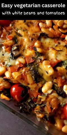 an easy vegetarian casserole with white beans and tomatoes is shown in a glass dish