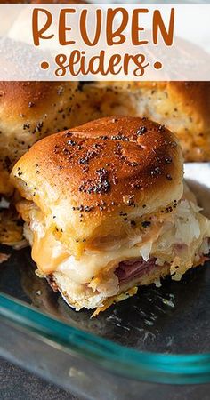 a close up of a sandwich on a plate with the words peupen sliders above it