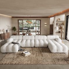 a large white sectional sofa in a living room