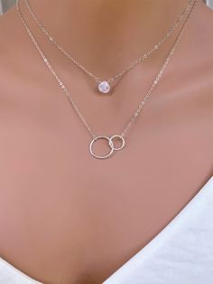 Multi Layered Necklace 14k Gold Fill. Perfect for Everyday use. It could be sterling silver as well. It is made of.. -10mm Moonstone drop is wire wrapped in Sterling silver/Gold fill - sterling silver /14k gold fill 15x23mm 18ga hammered Circle link , - 14k Gold Fill chain or Sterling silver chain with spring claw. - Come up with beautiful ribbon gift box and - One set of care instruction package . MORE LAYERED NECKLACE https://www.etsy.com/shop/rainbowearring?ref=hdr_shop_menu§ion_id=15232607 D Sterling Silver Gemstone Necklaces For Layering, Sterling Silver Necklaces For Layering, Silver Gemstone Necklace For Layering, Sterling Silver Double Strand Clavicle Chain Jewelry, Sterling Silver Double Strand Clavicle Chain, Sterling Silver Round Necklaces For Layering, Silver Layered Minimalist Jewelry, White Layered Jewelry Gift, Layering Sterling Silver Necklaces