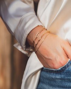 Upgrade your jewelry game with our Gold Renaissance · Paperclip Bracelet. This sleek, versatile piece is crafted with 18k gold-filled metal, offering a luxe, high-quality finish that'll last a lifetime. Each bracelet is perfectly crafted, ensuring a comfortable fit and worry-free wear. But it's not just about style - our Gold Renaissance · Paperclip Bracelet is hypoallergenic and nickel-free, making it safe for even the most sensitive skin. And with its water-resistant design, you don't have to worry about removing it for your daily activities. Details: • 18k Gold Filled Classic Paperclip Bracelet • Link size: 4.5 mm wide x 14mm long • Hypoallergenic Jewelry - Nickel Free • Water resistant • Rigorously manufactured under CA Prop 65 and EU standards • Handcrafted in Brazil. • Weight: 0.14 o Paperclip Bracelet, Hypoallergenic Jewelry, Daily Activities, Paper Clip, Sensitive Skin, Gold Filled, 18k Gold, Comfort Fit, Water Resistant