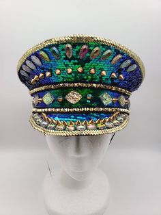 Blue and green iridescent music festival hat with multicolored stones and gold spikes. Changes color in different directions. One size. Very Small Wedding, Pilot Costume, Police Hat, Goat Horns, Military Hats, Lace Braid, Festival Hat, Halloween Masquerade, Festival Concert