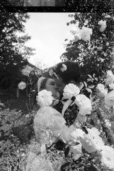 A couple kiss in the middle of a black and white photo. They are. Double-exposed with white roses all around them 35mm Film Photography, Unique Wedding Photography, Experimental Photography, Shoot Film, Brunch Wedding, Wedding Forward, Create Something