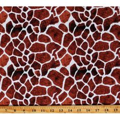 a giraffe print fabric on a ruler