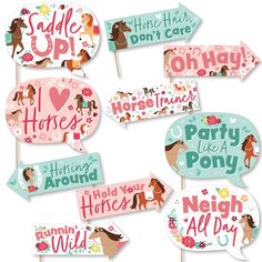 horse themed party photo booth props with pink, blue and green colors on top of each sign