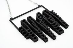 City skylines at night inspired this lightweight necklace. This pendant is made of 3D printed plastic and wears best directly resting on the body as the printing process lines remain and may catch on some fabrics.﻿ Are you looking for a necklace with some heft? This pendant is also available in steel. Details: Pendant Material: 3D Printed Black Plastic Neck Chain: 18-inch commercially available stainless steel chain Pendant Height: 71mm Pendant Width: 68mm Pendant Weight: lightweight City Skylines, Plastic Jewelry, Neck Chain, Chain Pendant, Black Plastic, City Skyline, Steel Chain, Chain Pendants, Stainless Steel Chain