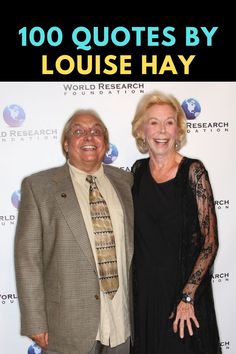 two people standing next to each other in front of a sign that says 100 quotes by louise hay