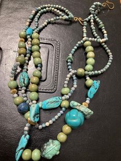 Vintage  1980's Clean, vibrant, quality turquoise rock stones,  One frog bead Different shapes and sizes. Round green turquoise  One large blue glass turquoise swirl bead. Gold spacer beads. Email any questions prior to purchase. No returns, refunds or exchanges. Turquoise Rock, Frog Necklace, Natural Turquoise Stone, Necklace Stone, Palm Coast, Necklace Turquoise, Multi Strand Necklace, Green Turquoise, Natural Turquoise