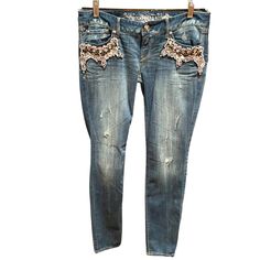 Nwt! Msrp $118! Medium Wash Distressed Denim By Express. Gorgeous Crystals In Clear And Smoke Gray In Various Shapes And Sizes Adorn The Front And Rear Pockets. Low Rise, Ultra Skinny’s. Zip And Single Button Closure. Size 4 Embellished Fitted Dark Wash Jeans, Fitted Embellished Medium Wash Jeans, Casual Embellished Jeans For Fall, Casual Embellished Denim Blue Jeans, Spring Embellished Denim Blue Jeans, Casual Blue Embellished Jeans, Salmon Pants, Low Rise Leggings, High Rise Black Jeans