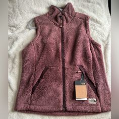 Women’s Ultra-Warm. Fleece Vest. Elastic-Bound Center Front Zip. Secure-Zip Hand Pockets Sherpa Fleece. Burgundy. Purple North Face Vest, Black North Face Vest, North Face Fleece Vest, North Face Vest, White Puffer, North Face Coat, Womens Puffer Vest, Brown Vest, Grey Vest