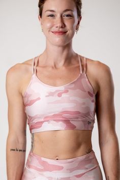 Mika Body Wear - Yoga Tops - Mariah Top #color_hide-in-pink Strappy Stretch Tops Athleisure, Fitted Strappy Gym Tops, Fitted Strappy Sports Tops, Fitted Strappy Tops For Sports, Athleisure Strappy Top With Built-in Bra, Athleisure Tops With Built-in Bra And Strappy Shape, Athleisure Tops With Built-in Bra And Strappy Design, Workout Top With Adjustable Straps And Cross Back, Fitted Strappy Athleisure Top