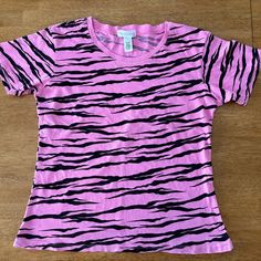 Never Worn! Super Cute And Snug Fit But Definitely A Medium Fit. Good Quality Tshirt. Scoop Neck Top With Graphic Print And Stretch, Pink Scoop Neck Casual T-shirt, Basic Pink Scoop Neck T-shirt, Pink Tiger Shirt, Pink Tiger Print, Tiger Print Graphic Tee With Short Sleeves, Pink Cotton Scoop Neck T-shirt, Pink Stretch T-shirt With Scoop Neck, Pink Stretch T-shirt With Text Print