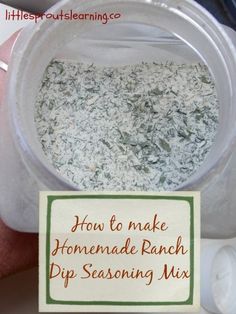 a hand holding a jar filled with homemade ranch dip seasoning mix and a sign that says how to make homemade ranch dip seasoning mix