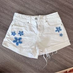 - White With Denim Flowers - Bought But Never Worn - Great Quality White Denim Jeans For Spring, White Denim Jean Shorts For Summer, White Denim Jeans For Summer, White Denim Jeans For Day Out, White Summer Jeans For Beach, White Jeans For Beach In Summer, White Cutoff Jean Shorts For Spring, White High-rise Denim Jean Shorts, White High Rise Denim Jean Shorts