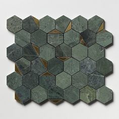 green marble hexagonal tiles with gold foiled edges on a white background, arranged in rows