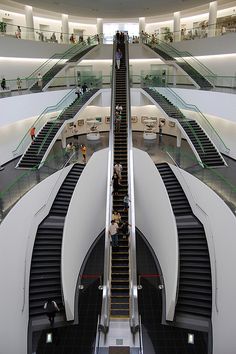 an escalator in the middle of a building