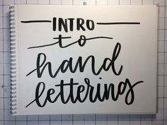 a notebook with the words into to hand lettering on it