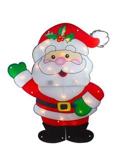 a lighted christmas decoration with a santa clause standing in front of it's head