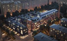 an aerial view of some buildings at night