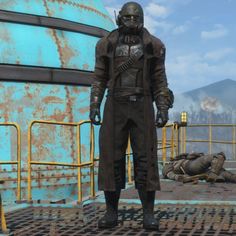 a man in a gas mask standing next to a large metal object on the ground