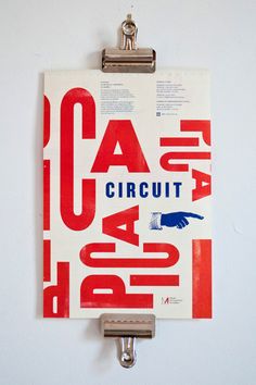 there is a clipboard with the words circuit and an arrow in red on it