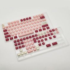 two red and white keyboards sitting next to each other