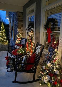 christmas decorations on the front porch with rocking chairs